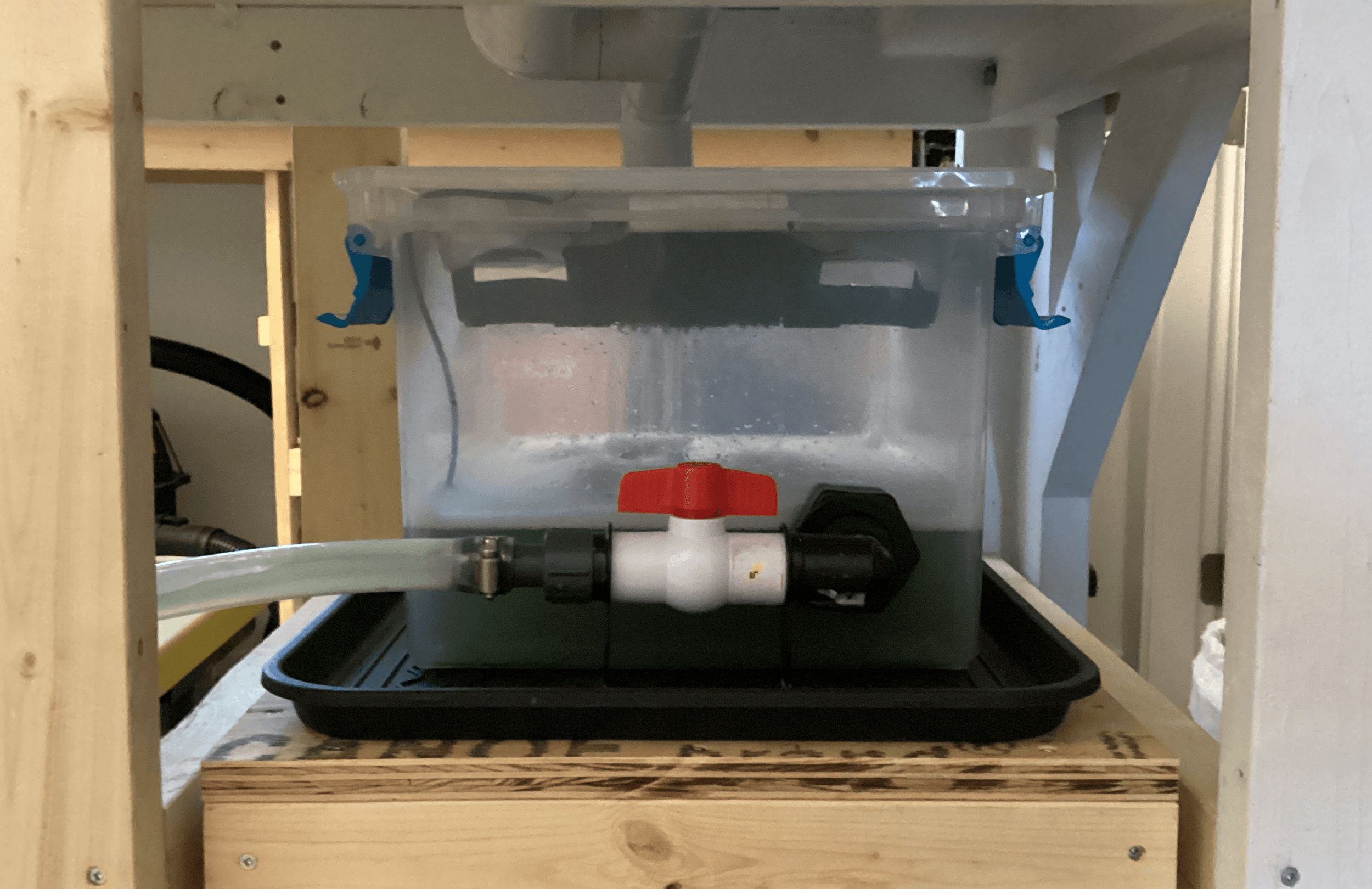 Slider shelf, catch basin, chip filter and drain viewed from the back