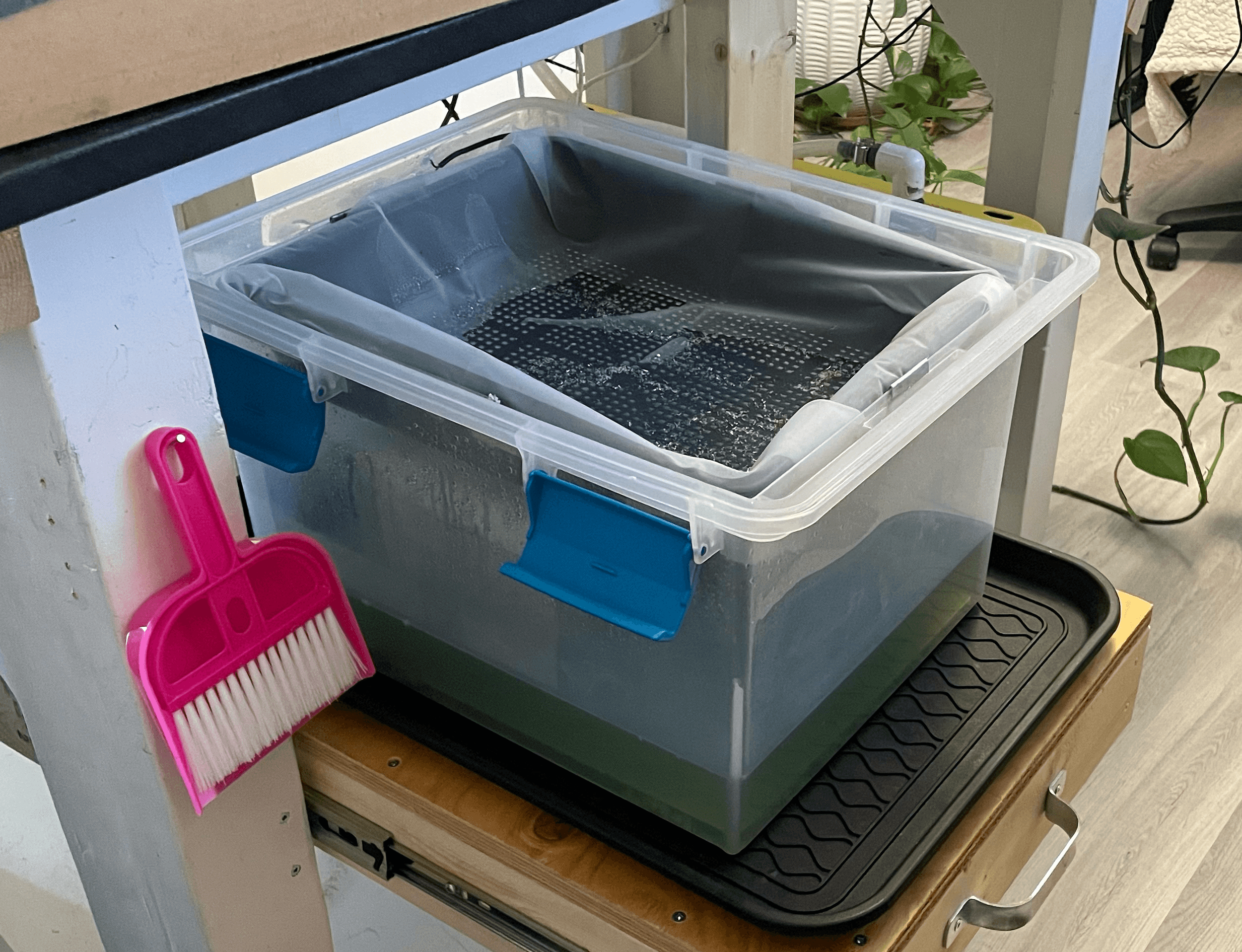 Shelf pulled out showing catch basin with empty chip basket