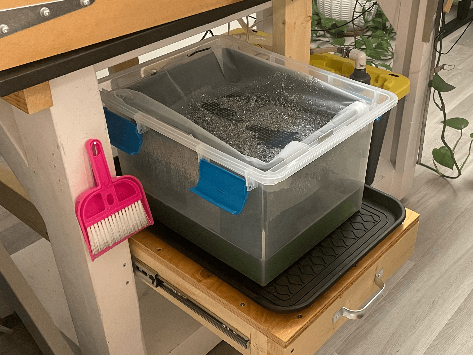 Slider shelf with catch basin and chip filter